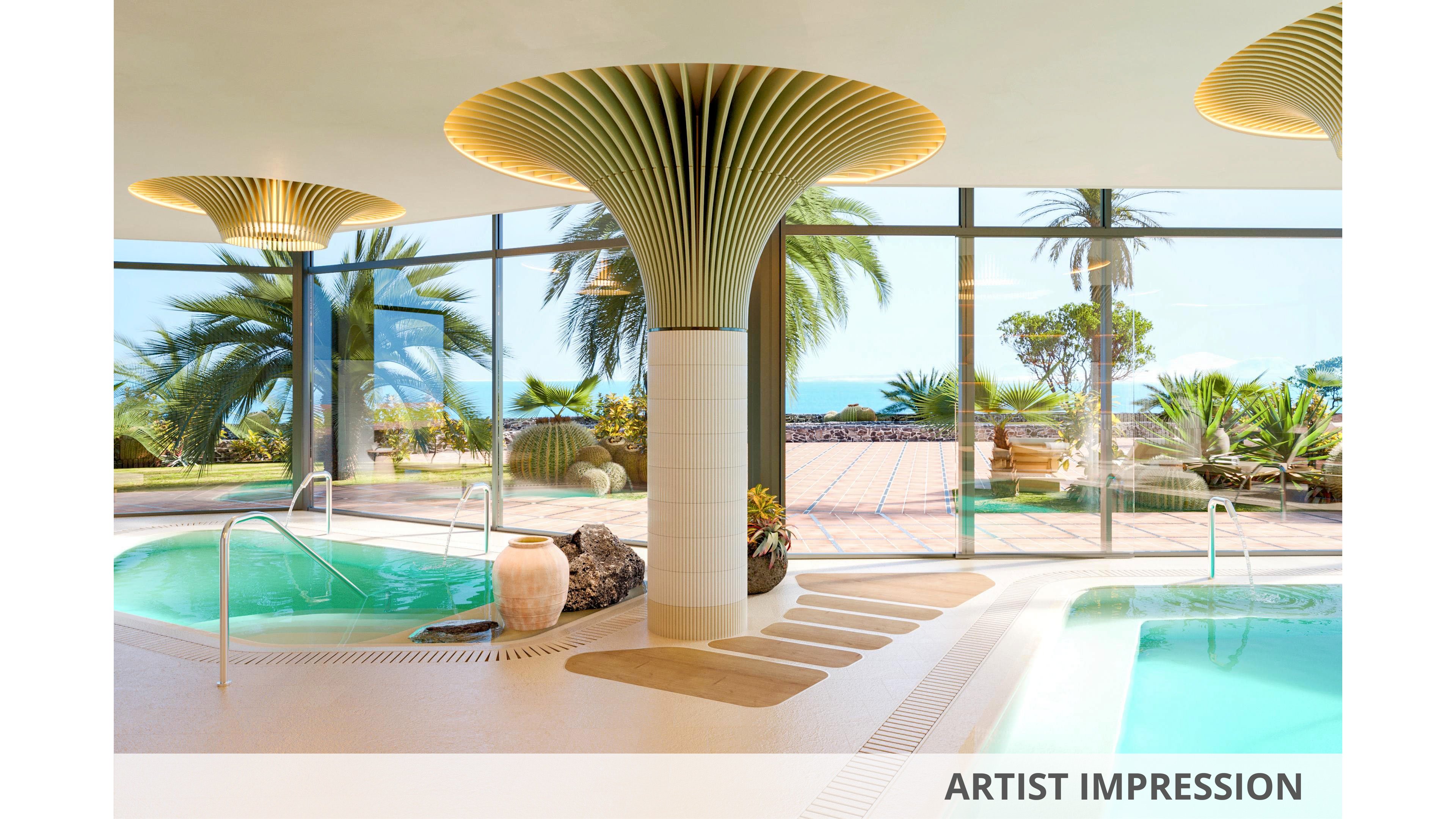 Bright, modern spa interior featuring turquoise pools and sculptural column lighting. Large floor-to-ceiling windows reveal lush palm trees and a distant oceanfront terrace. Stainless steel handrails, stone accents, and a ceramic vase enhance the resort-like atmosphere. The words ARTIST IMPRESSION appear along the bottom edge of the image.