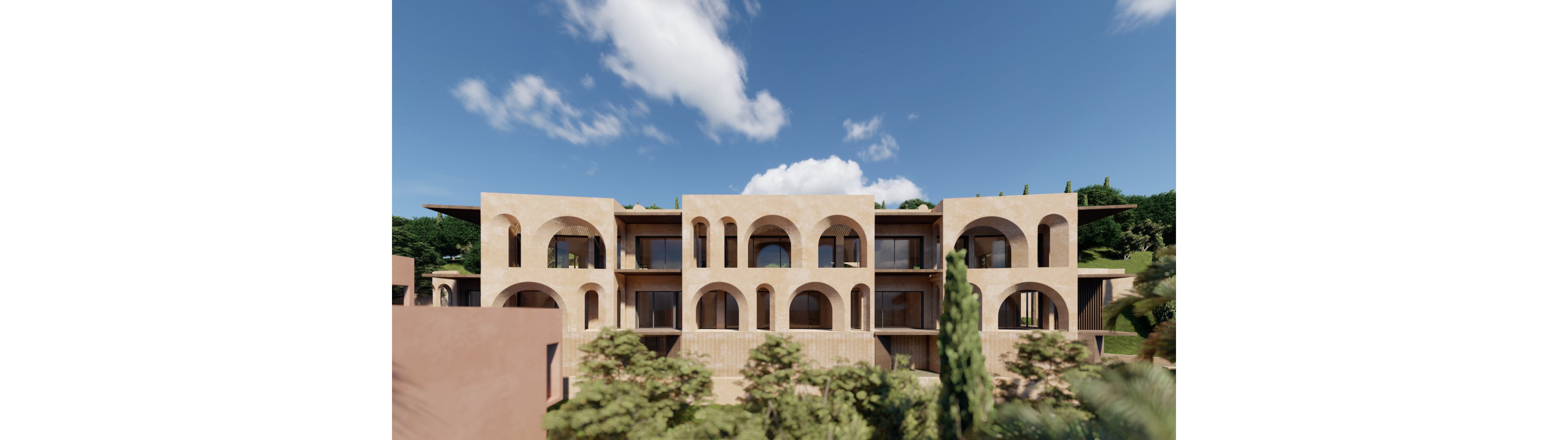 A contemporary multi-story apartment building features a façade of large, repeated arches and warm beige stone. The structure is set amid lush greenery and trees, suggesting a Mediterranean or resort-style environment. Clear blue sky with scattered white clouds enhances the bright, sunny atmosphere. Glass balconies and open terraces add a modern touch to the architectural design.