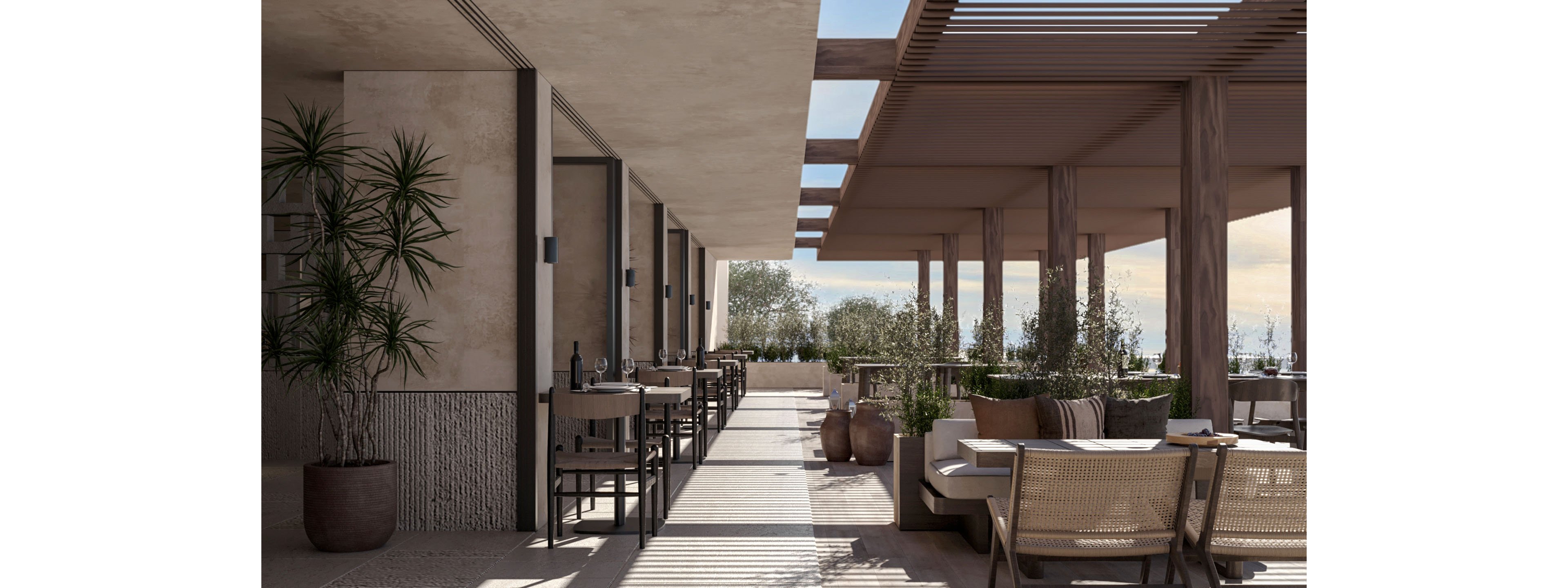 A contemporary open-air restaurant terrace features wooden pergolas and neutral-toned architecture. Tables and chairs are arranged along a corridor, with wine bottles and glassware set for dining. Potted plants and greenery soften the space, creating a relaxed, upscale atmosphere. Warm natural light enhances the minimalist, earthy design and inviting seating areas.