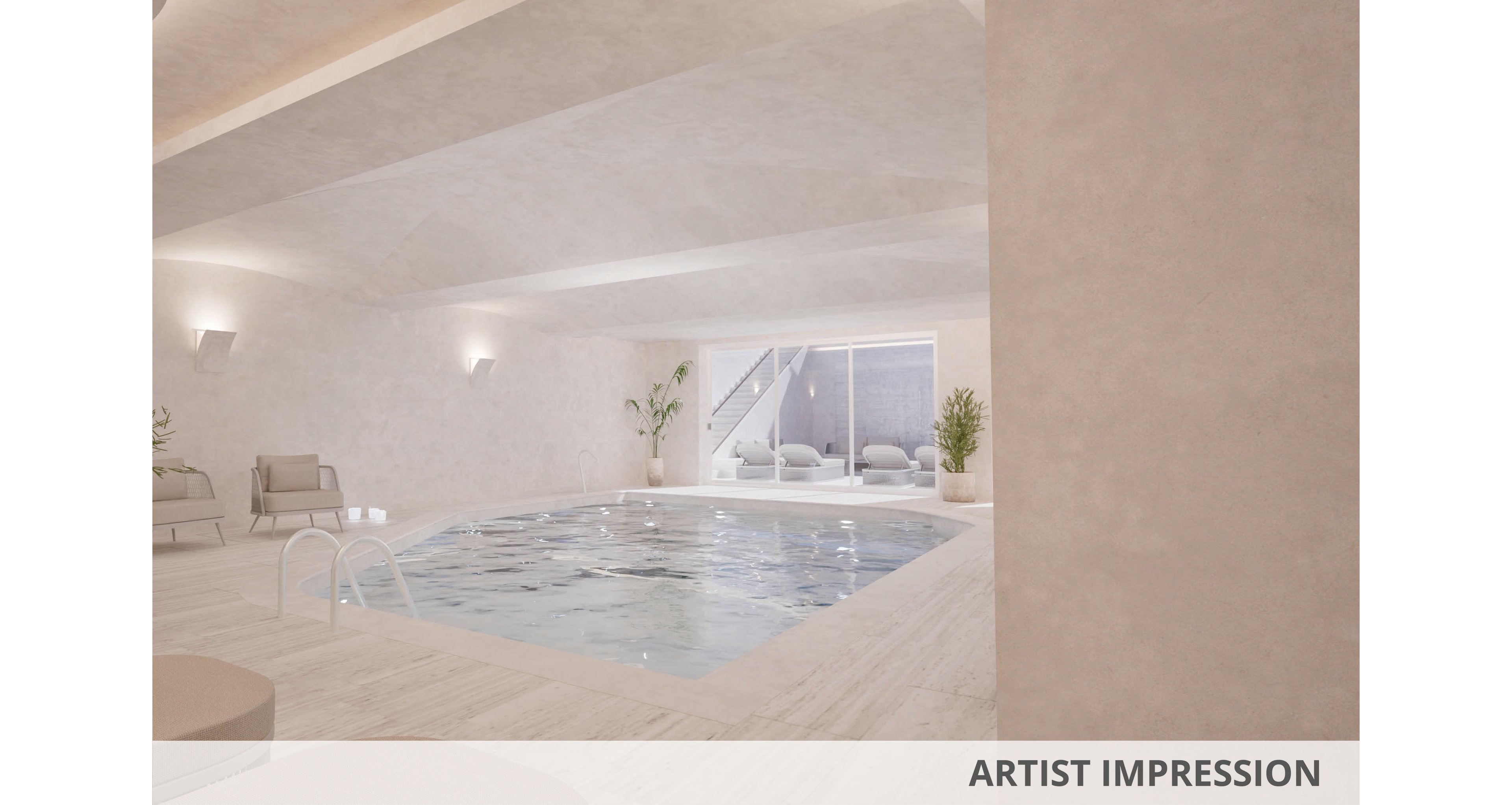 Rendered visualization of a contemporary indoor swimming pool in a neutral, minimalist space. The pool is surrounded by light stone flooring, lounge chairs, and potted plants, creating a calm and relaxing atmosphere. Large glass doors at the far end open to an outdoor terrace with additional seating. Soft wall lighting enhances the serene mood of the scene. The phrase "ARTIST IMPRESSION" appears in the lower right corner of the image.