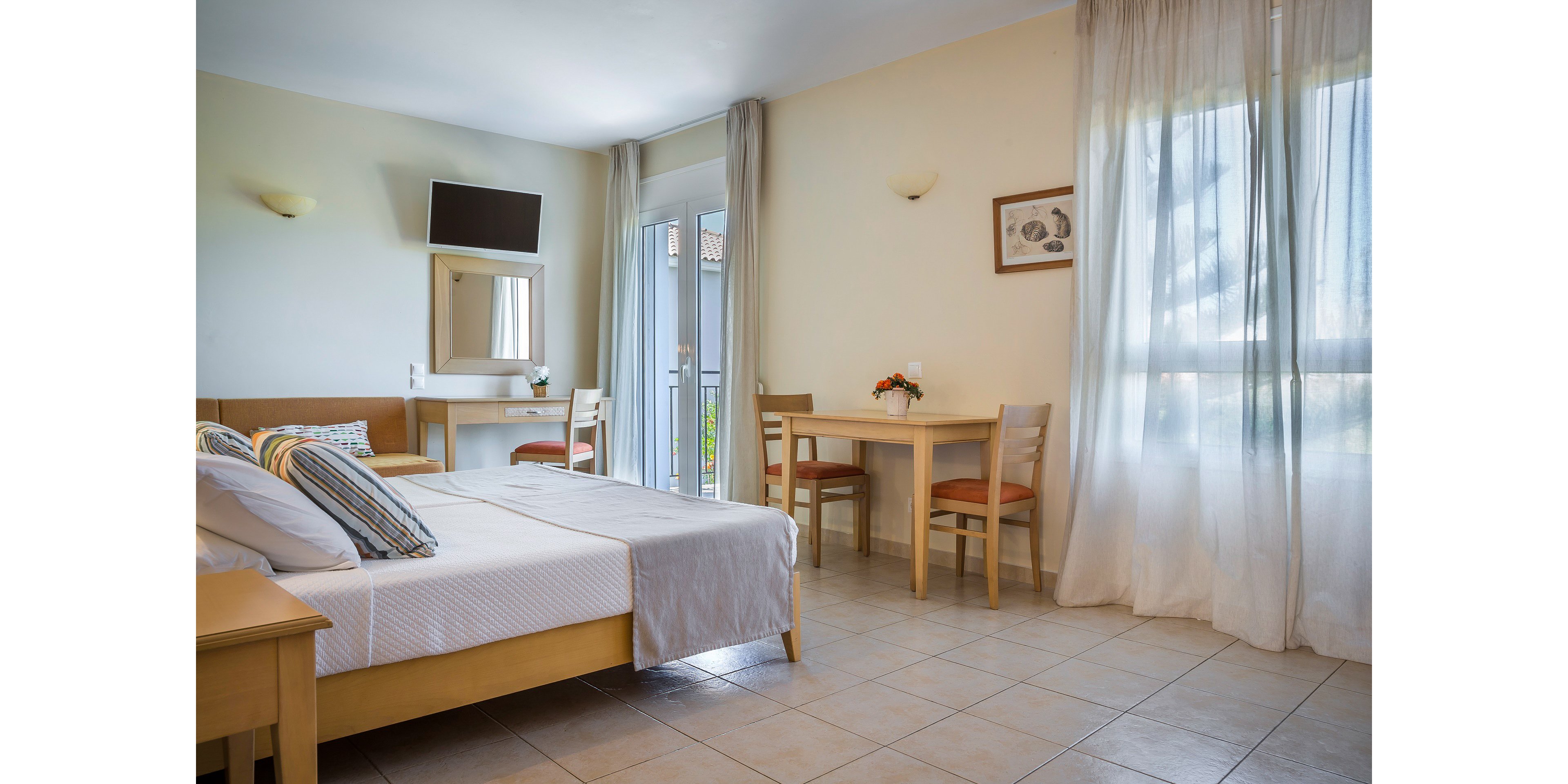 Astra Village Hotel & Suites