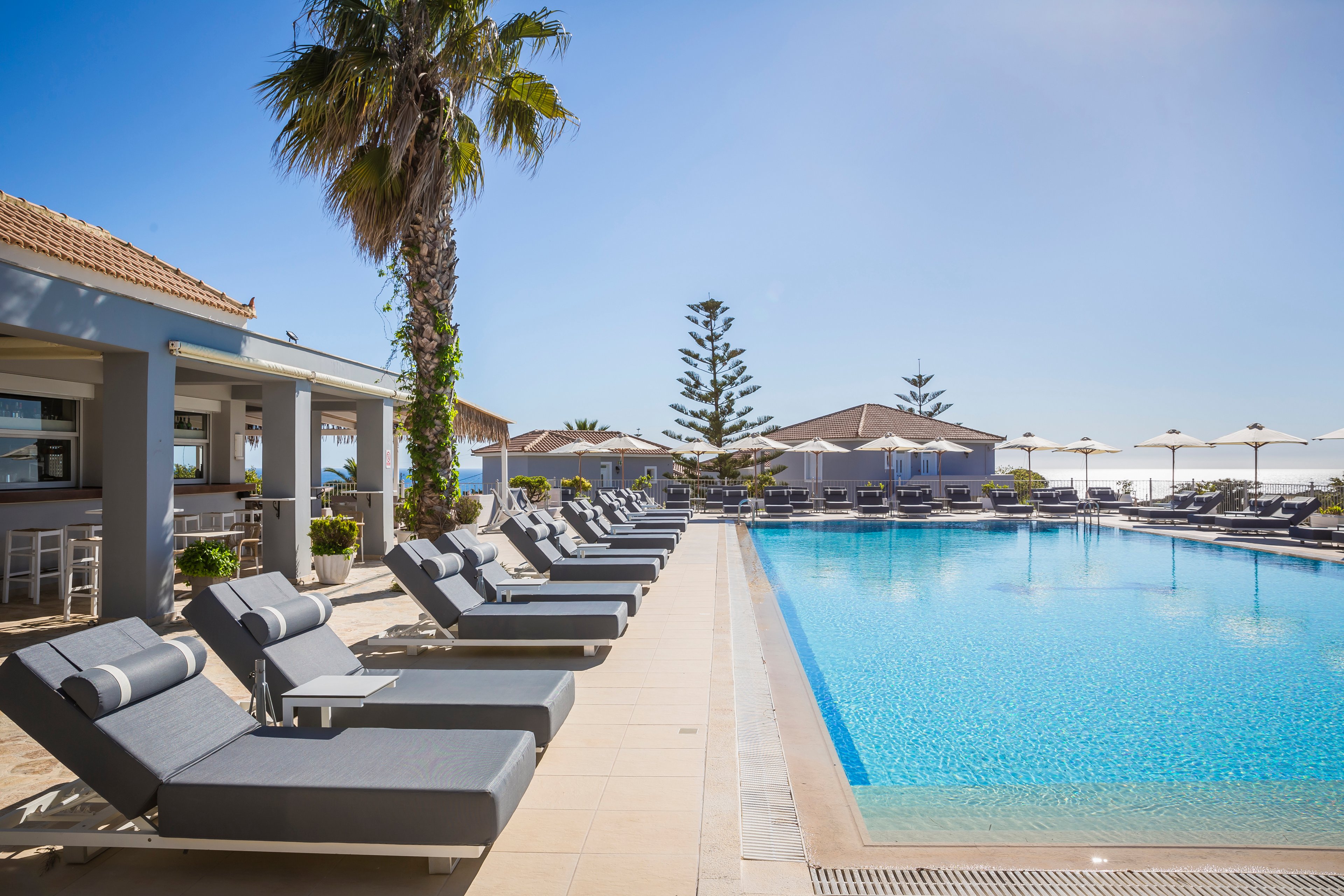 Astra Village Hotel & Suites