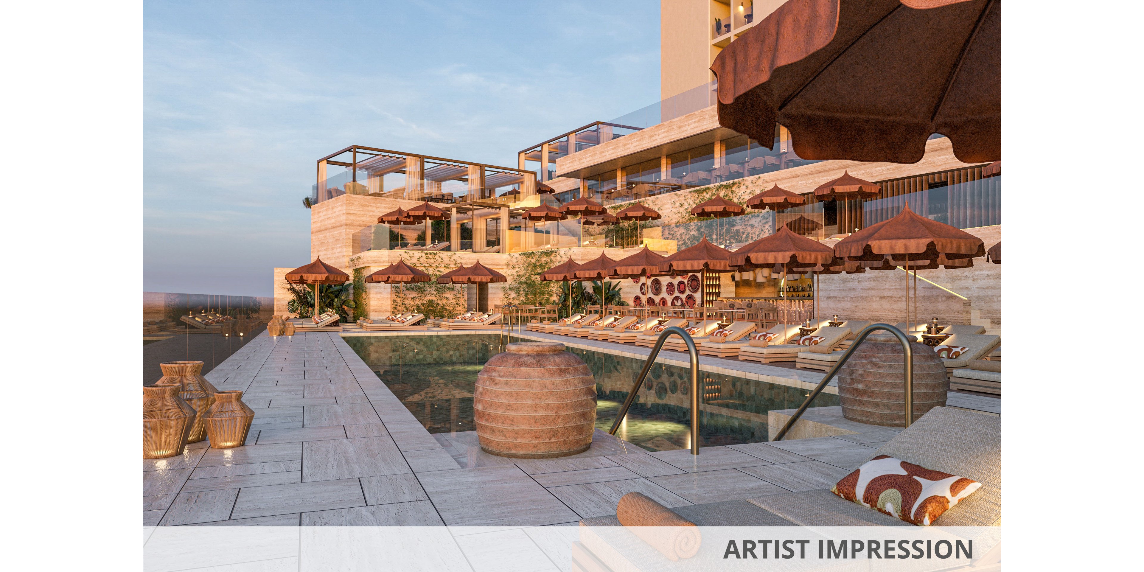 A luxurious rooftop infinity pool is surrounded by cushioned lounge chairs and large umbrellas at an upscale resort. The architecture features layered stone terraces, glass railings, and warm earth-toned materials overlooking a distant horizon. Decorative pottery, rolled towels, and patterned pillows add a refined, Mediterranean-inspired touch to the scene. Soft sunset lighting creates a tranquil, inviting atmosphere ideal for relaxation and leisure.