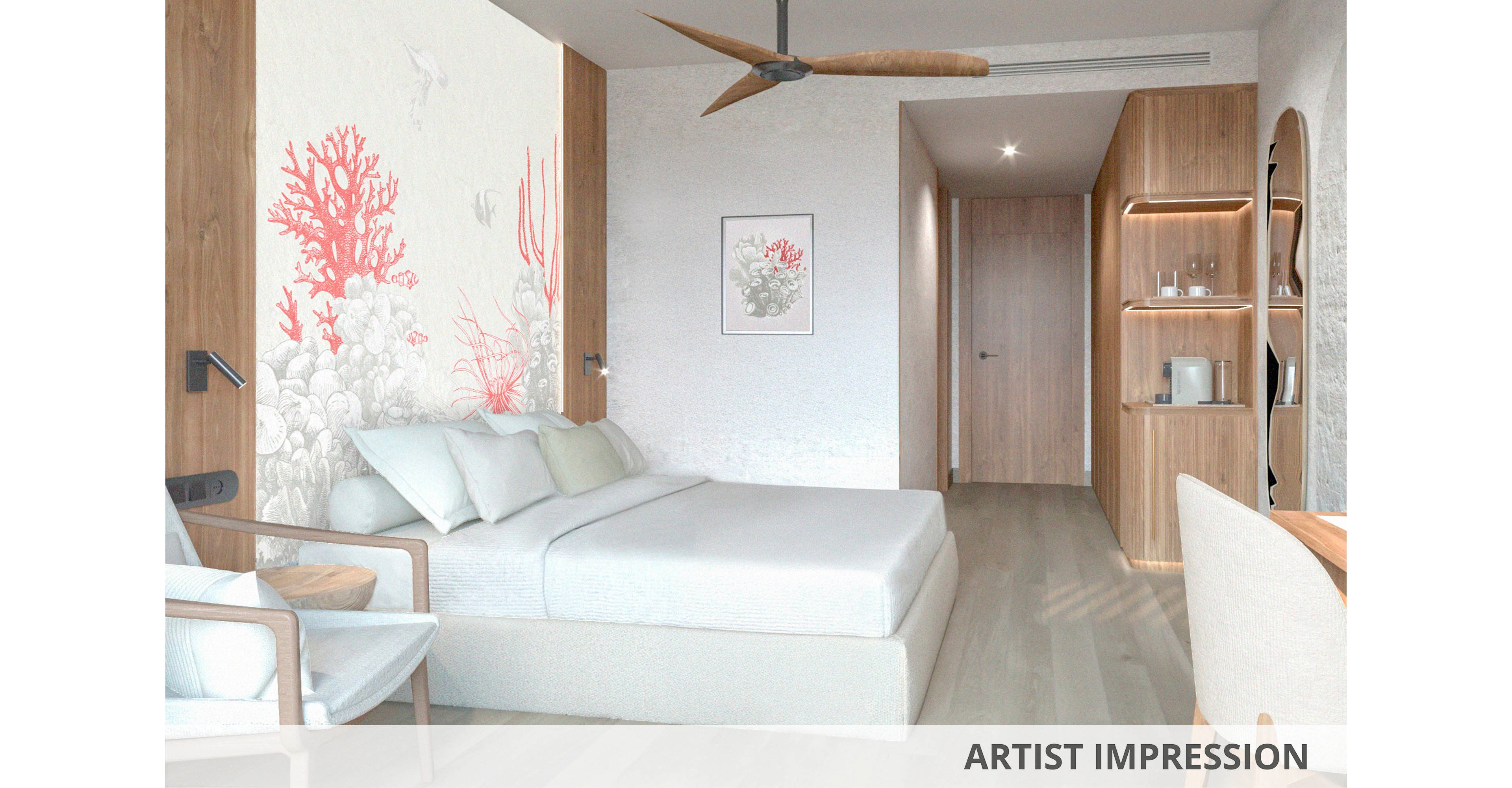 Contemporary hotel-style bedroom featuring a large bed with white linens and soft cushions. The focal point is a decorative wall mural with coral reef illustrations in soft red and gray tones. Warm wooden panels, built-in shelving, and a compact refreshment area add functionality and style. A ceiling fan, minimalist furniture, and neutral flooring create a calm, airy atmosphere. The words "Artistic Impression" appear subtly at the bottom of the image.
