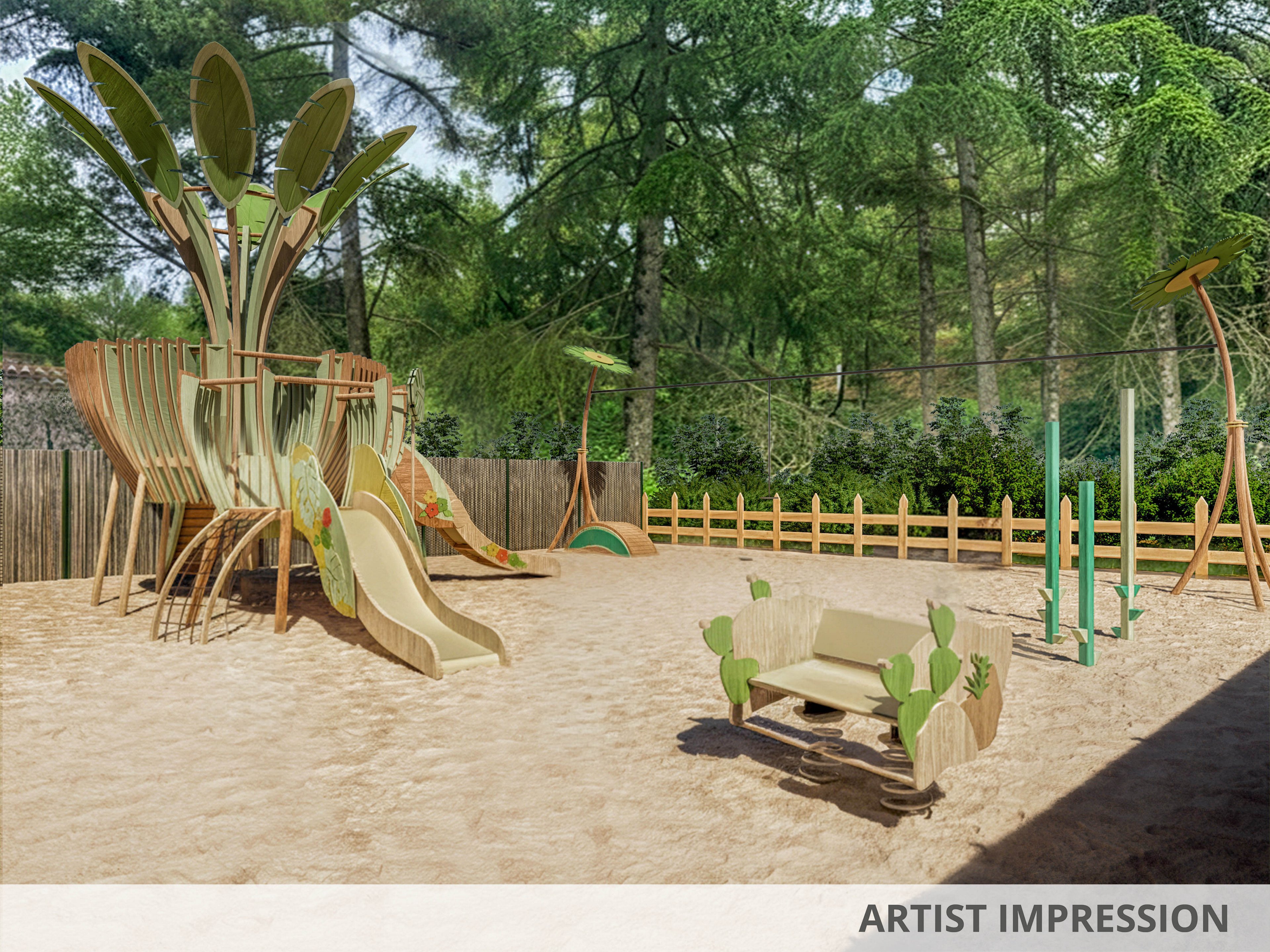 Several young children play in a sandy outdoor playground surrounded by tall trees and a wooden fence. The main structure is a large, nature-themed playset with slides, climbing elements, and leaf-like decorations. Kids are engaged with sand toys, a seesaw, and other play equipment scattered around the area. The scene feels bright, safe, and playful in a natural setting.