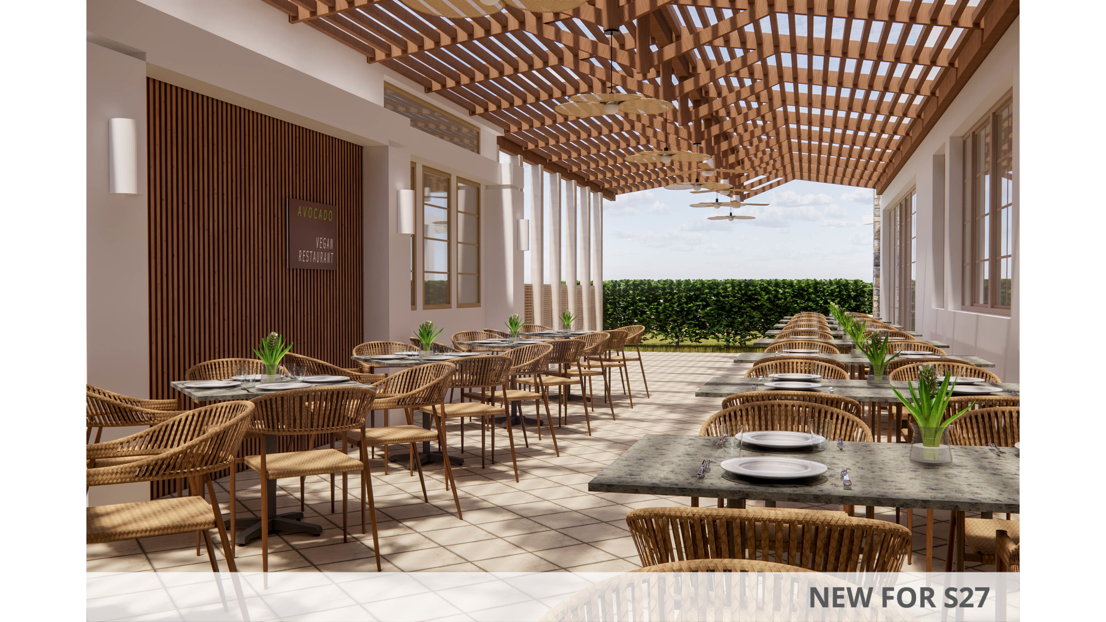 An open-air restaurant terrace features neatly arranged tables with wicker chairs and place settings. A wooden slatted pergola casts patterned shadows across the tiled floor, creating a warm and inviting atmosphere. Green plants and a hedge line the edge of the space, framing the view toward the bright sky. The scene appears calm and ready for guests, emphasizing natural materials and contemporary design.