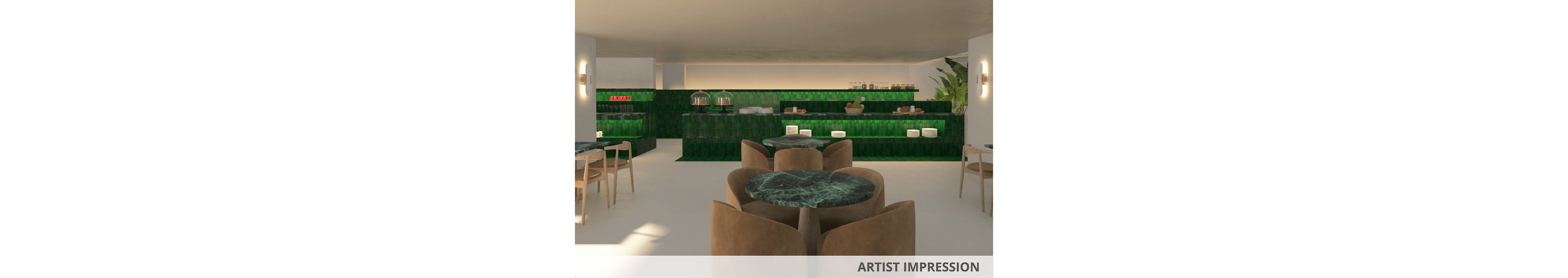 A contemporary cafe features round green marble tables and plush brown chairs arranged in a spacious, minimalist setting. The back wall and counter are covered in glossy green tiles, with food displays and serving dishes visible. Warm lighting and neutral tones create a relaxed, inviting atmosphere. No visible text or numbers are present in the image.