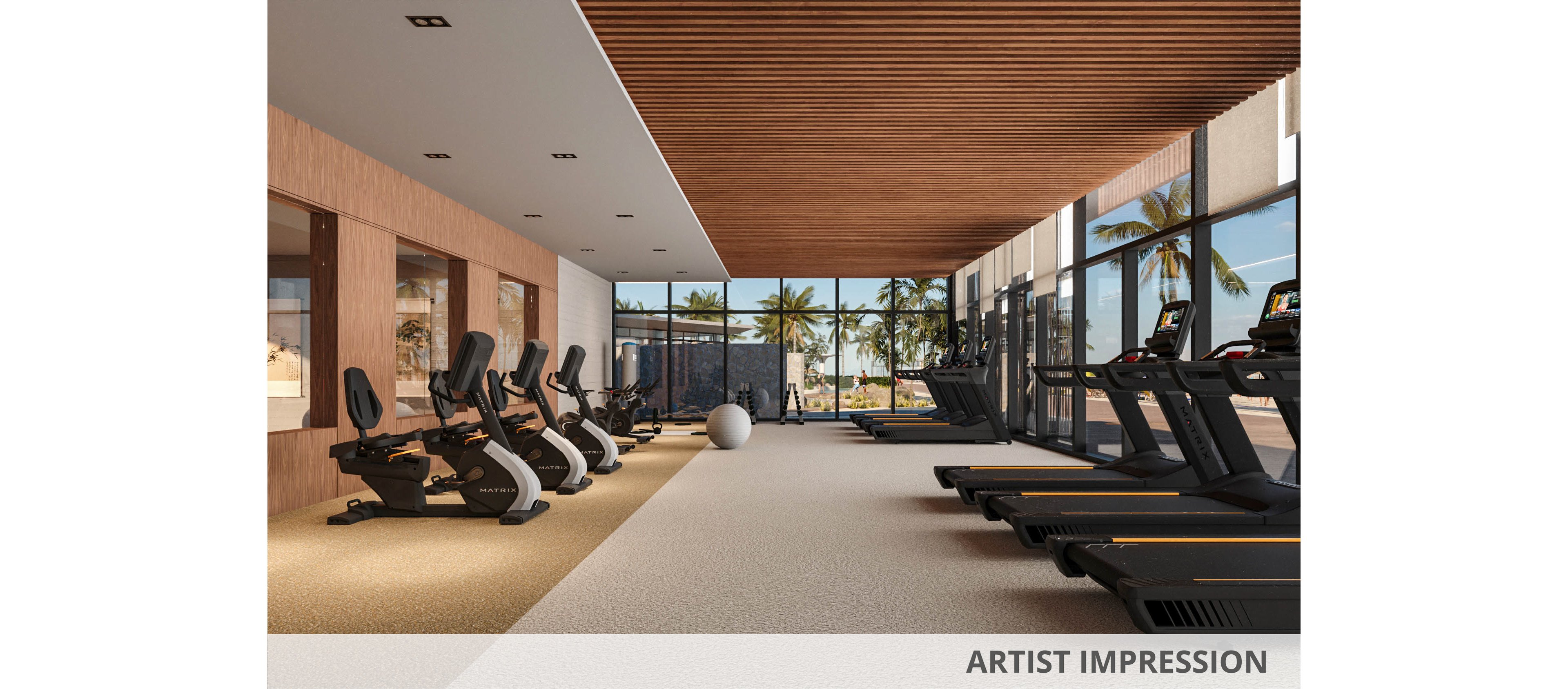 Spacious contemporary gym interior featuring treadmills and stationary bikes arranged in neat rows. Large floor-to-ceiling windows reveal palm trees and an outdoor pool area, suggesting a coastal or resort setting. Warm wooden ceiling slats and wall panels contrast with light flooring, creating a clean and inviting atmosphere. The room is empty of people, emphasizing the equipment, natural light, and serene environment.