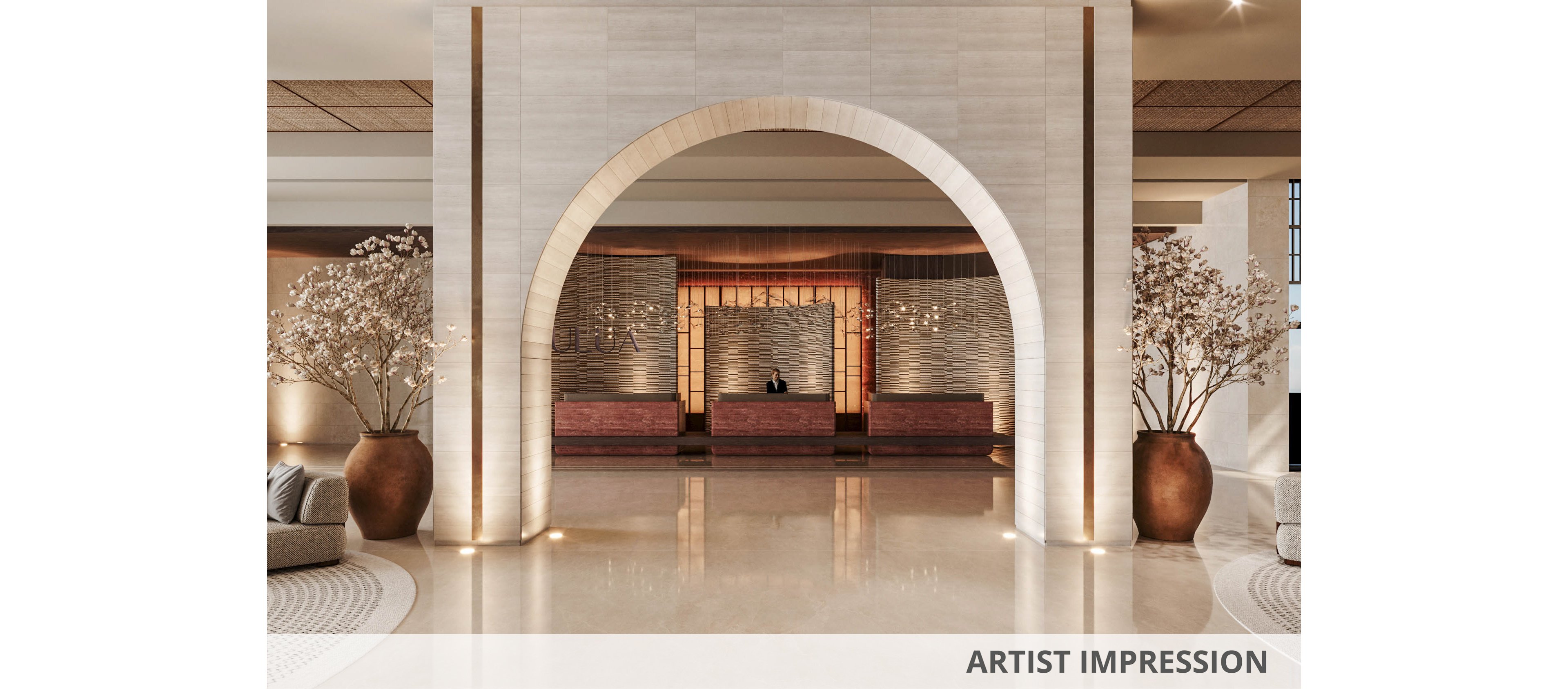 A spacious, upscale hotel lobby features a large central archway framing the reception desk in the background. Warm lighting reflects off the polished marble floor, creating an inviting atmosphere. Large decorative vases with flowering branches flank the arch, adding natural elegance. Comfortable lounge seating with cushions is arranged on the sides, suggesting a serene and welcoming guest experience.