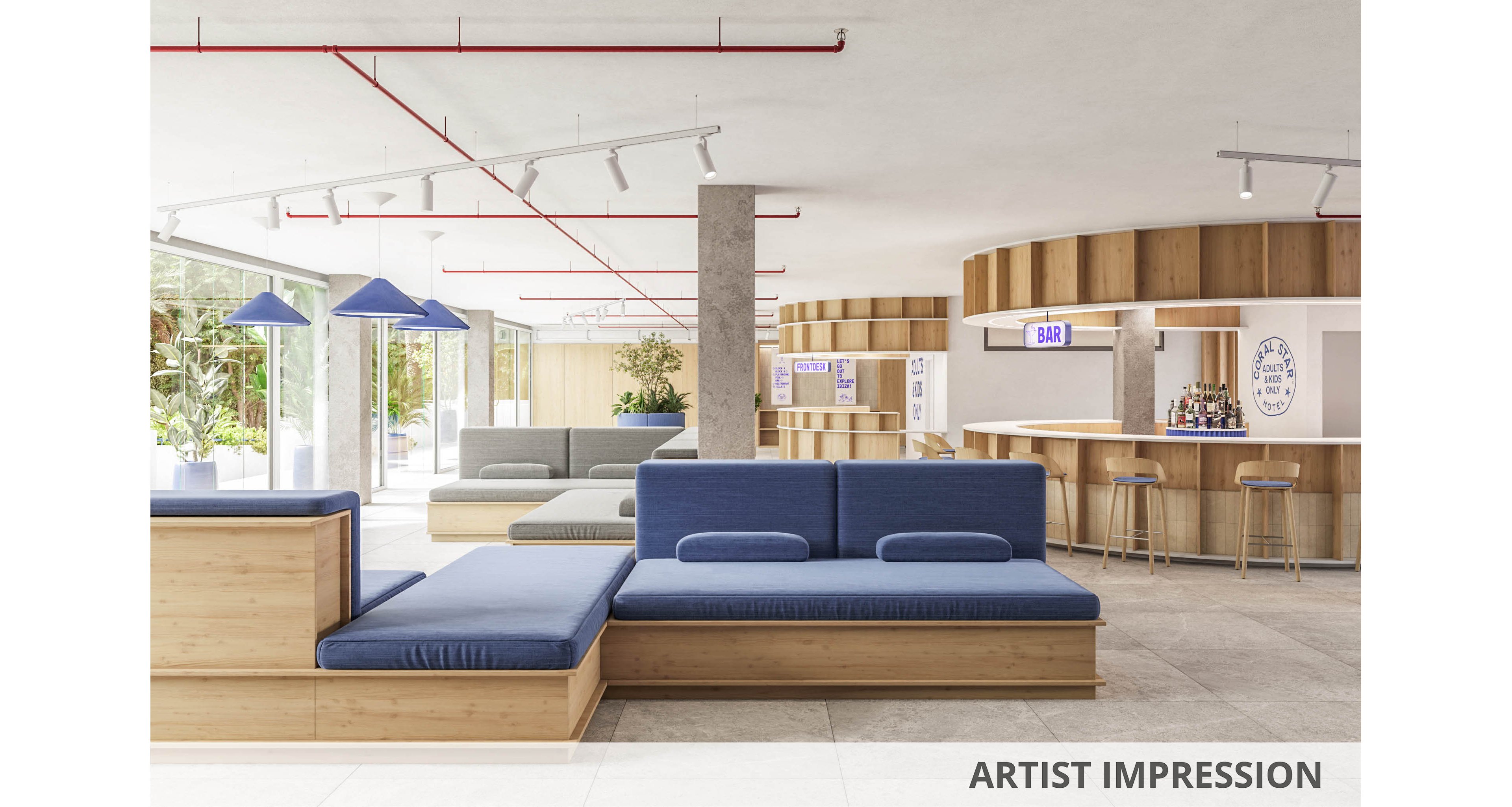 A spacious modern lobby features minimalist wooden seating with blue upholstered cushions. Large windows on the left bring in natural light and views of greenery outside. In the background, a curved wooden bar area with stools and illuminated signage creates a social focal point. Neutral floor tiles and clean white ceilings with track lighting and exposed red piping emphasize the contemporary design.