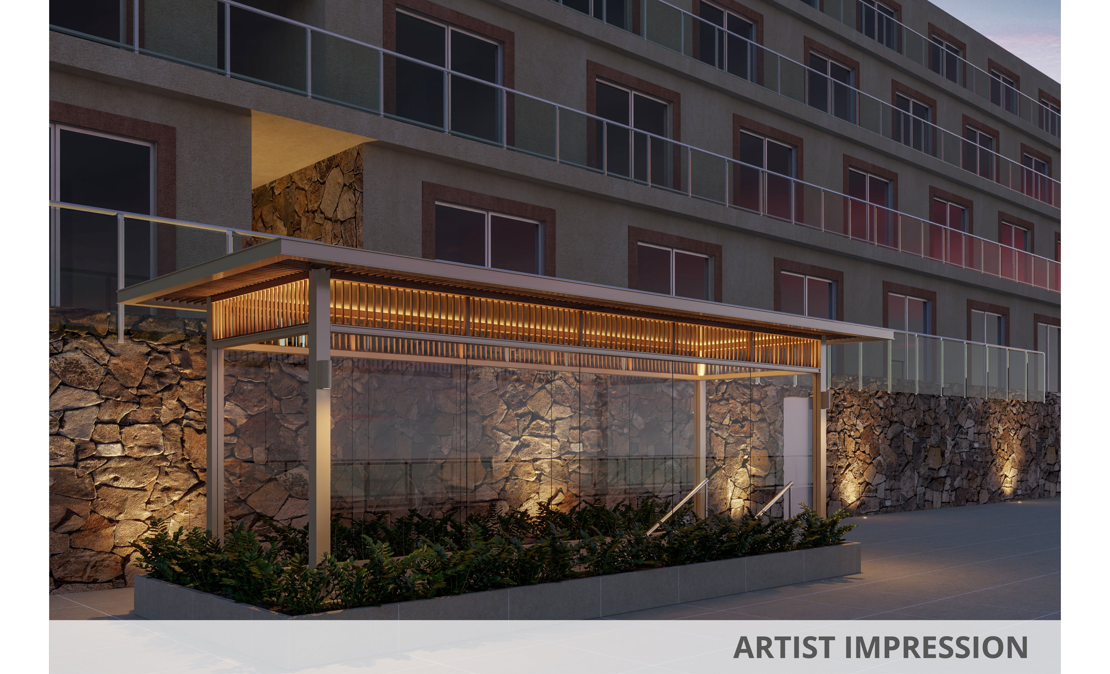 A contemporary outdoor entrance canopy is illuminated with warm lights in front of a multi-story building. The structure features a sleek metal frame, slatted roof detail, and glass panels backed by a stone retaining wall. Recessed lighting along the wall and under the canopy highlights the stairs and doorway. Low planter boxes with greenery soften the architectural lines and enhance the evening ambiance.
