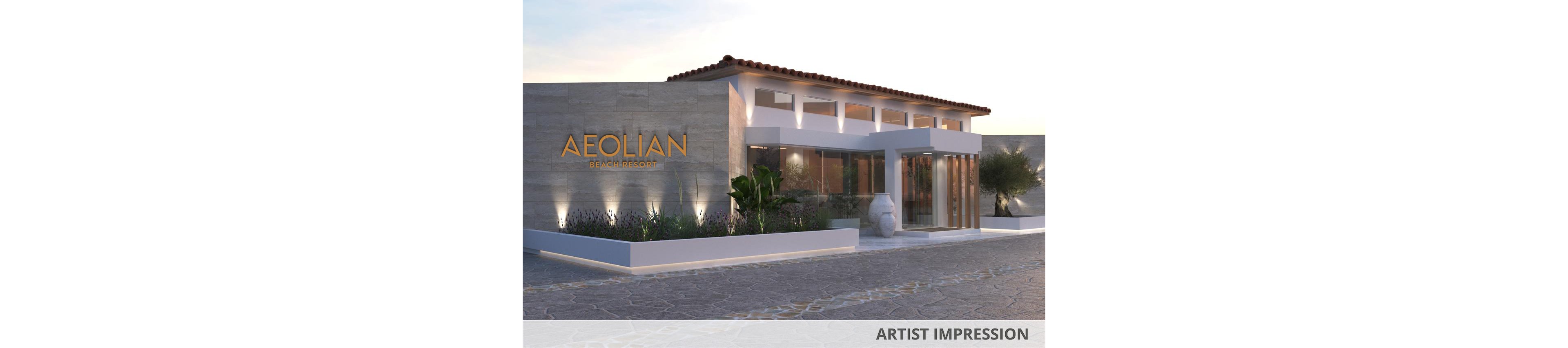 The image shows the main entrance of the Aeolian Beach Resort, featuring a modern architectural design with clean lines and large glass doors. The setting is outdoors during sunset, with soft lighting highlighting the stone facade and lush landscaping. The resort name 'AEOLIAN BEACH RESORT' is clearly visible in gold lettering on the wall. Decorative plants and a large ceramic vase add to the welcoming atmosphere.