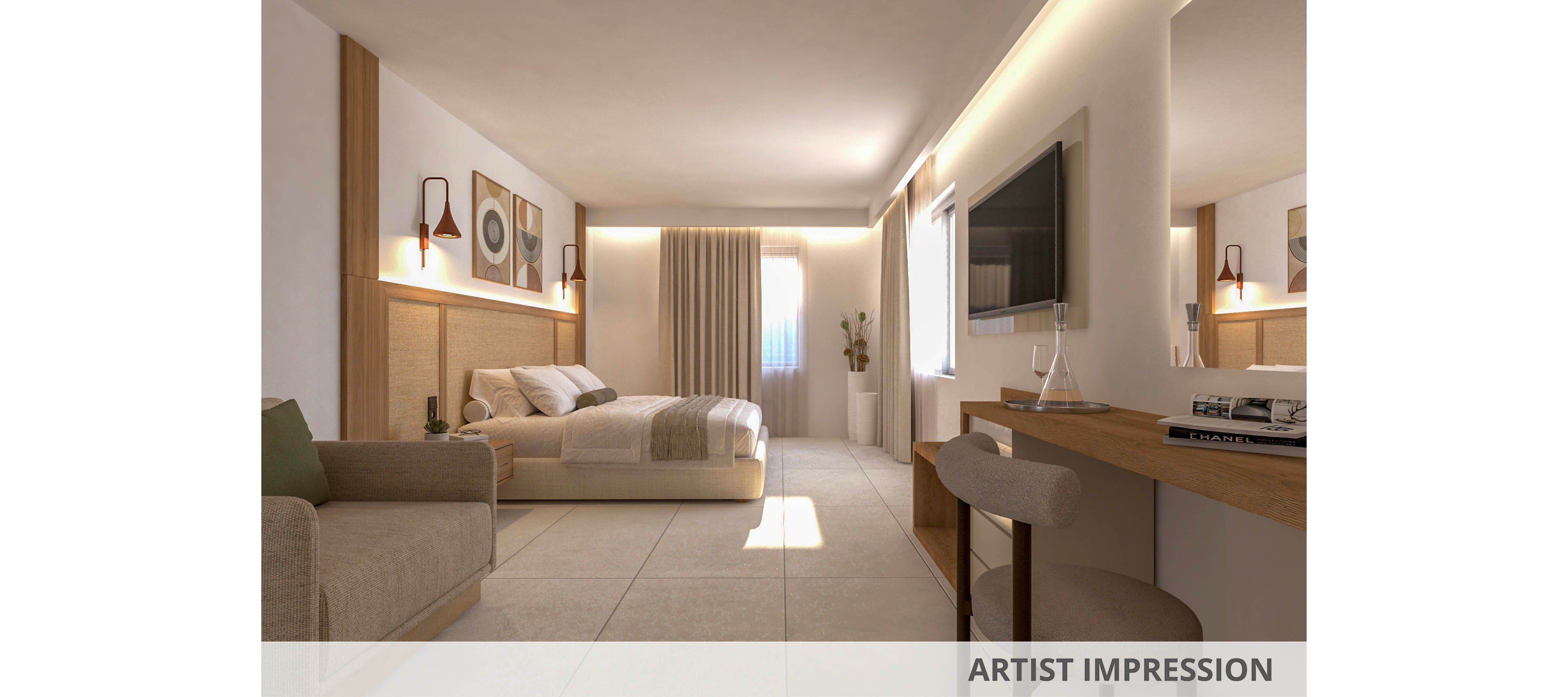 A spacious, contemporary hotel room features a large bed with minimalist bedding, a cozy sofa, and a wall-mounted television. The setting is bright with natural light streaming through a window, complemented by soft, neutral tones and modern artwork on the walls. The room includes a small bar area with stools and decorative lighting, creating a calm and inviting atmosphere.