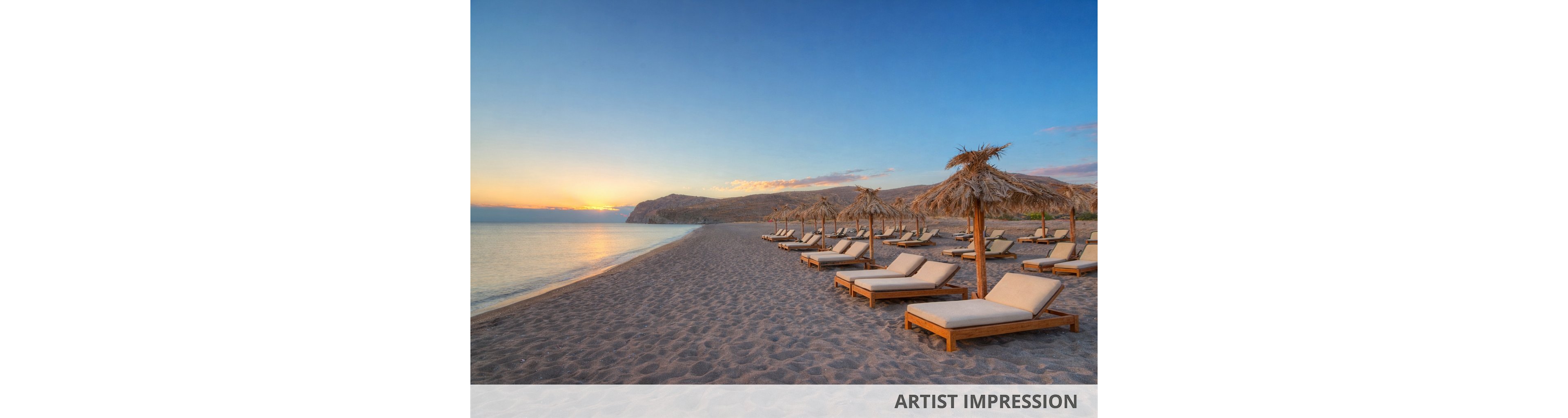 A row of wooden loungers with cushions is arranged under straw umbrellas on a sandy beach. The scene is tranquil, with no people present, and the sun is rising over distant hills, casting a warm glow. The sky is clear, and the calm sea gently meets the shore, creating a peaceful vacation atmosphere.