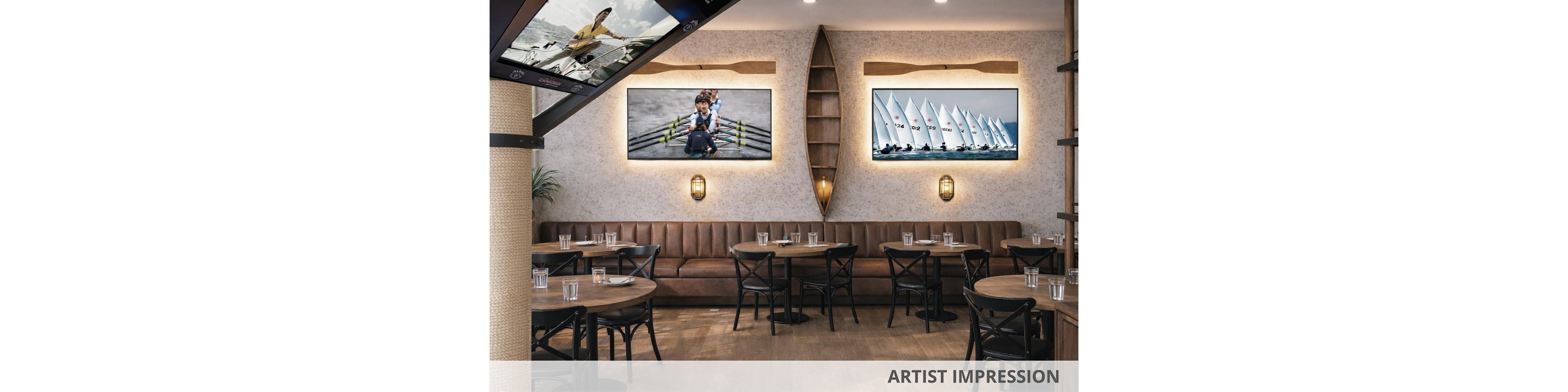 A contemporary café features brown leather banquette seating and round wooden tables, each set with clear drinking glasses. The walls are decorated with large framed photographs, including images of sailing boats and a child on a dock, as well as a boat-shaped shelf. The setting is well-lit with a cozy, inviting atmosphere and subtle nautical accents.