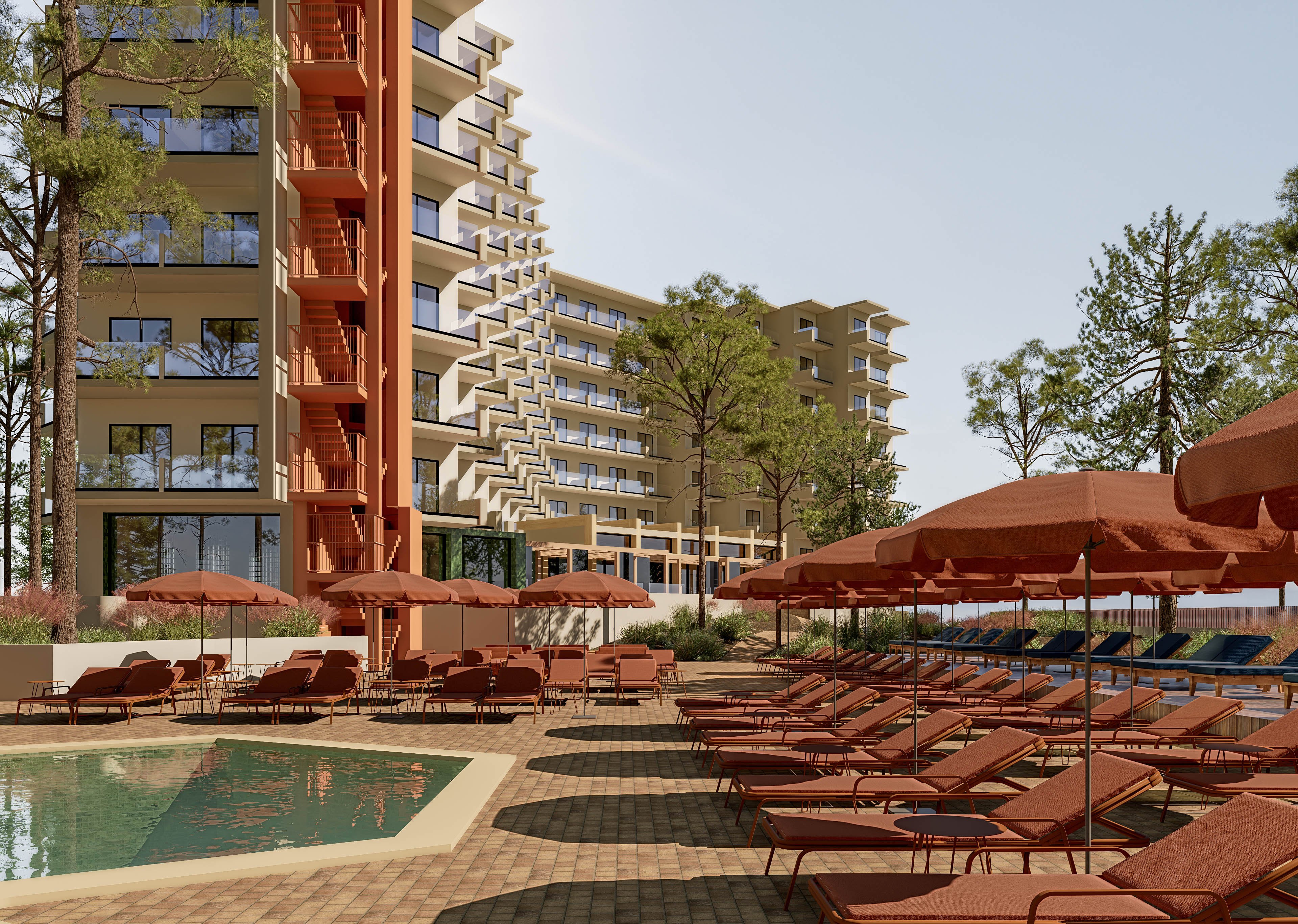 A contemporary resort complex features tall apartment-style buildings overlooking a spacious poolside terrace. Numerous sun loungers and umbrellas are arranged in neat rows beside a small swimming pool. The scene is surrounded by tall trees, adding greenery to the warm-toned architecture. The overall atmosphere suggests a relaxed vacation setting on a sunny day.