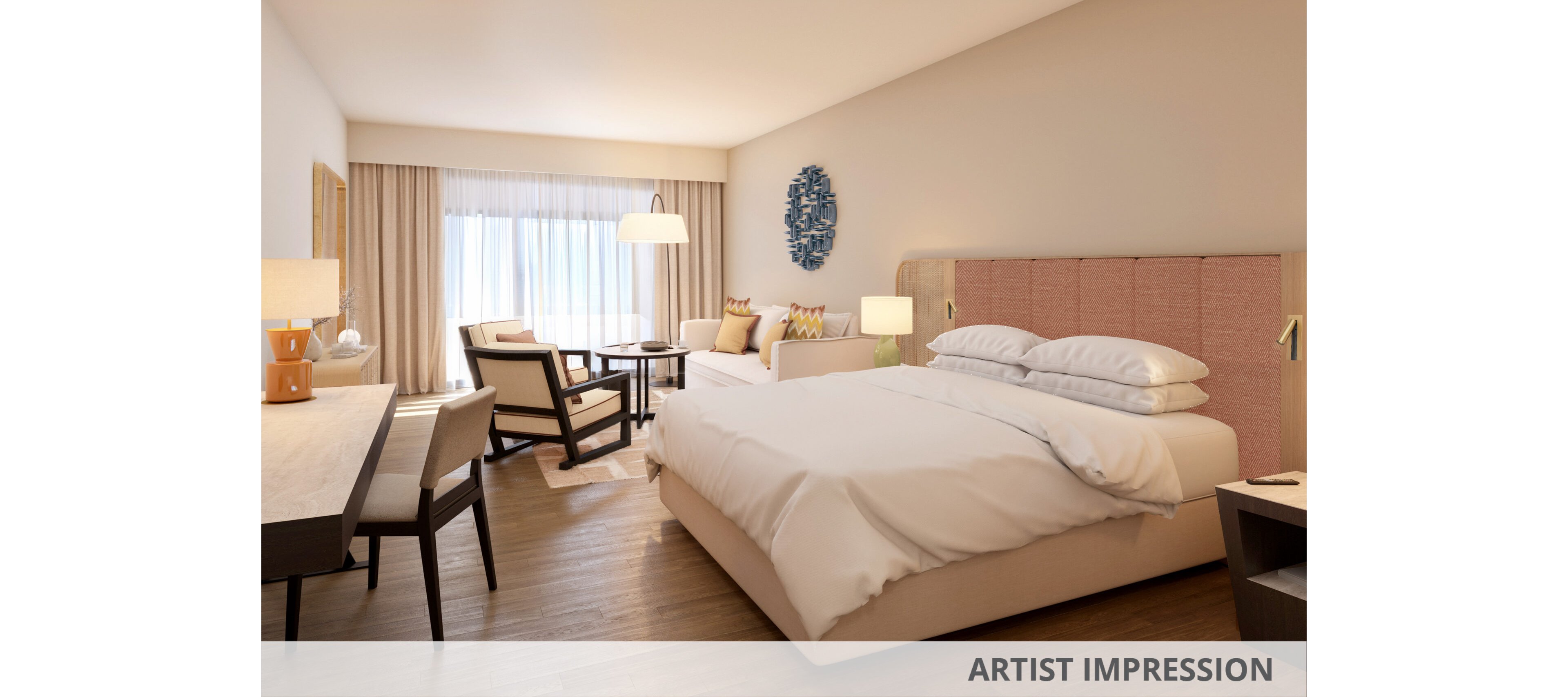 Contemporary hotel room featuring a large neatly made bed with white linens and a padded headboard. A seating area with armchairs and a small table is positioned near a large window with sheer curtains, allowing natural light to fill the space. A desk with a chair and lamp sits along one wall, providing a workspace. Warm wood flooring, neutral tones, and soft lighting create a calm, inviting atmosphere.