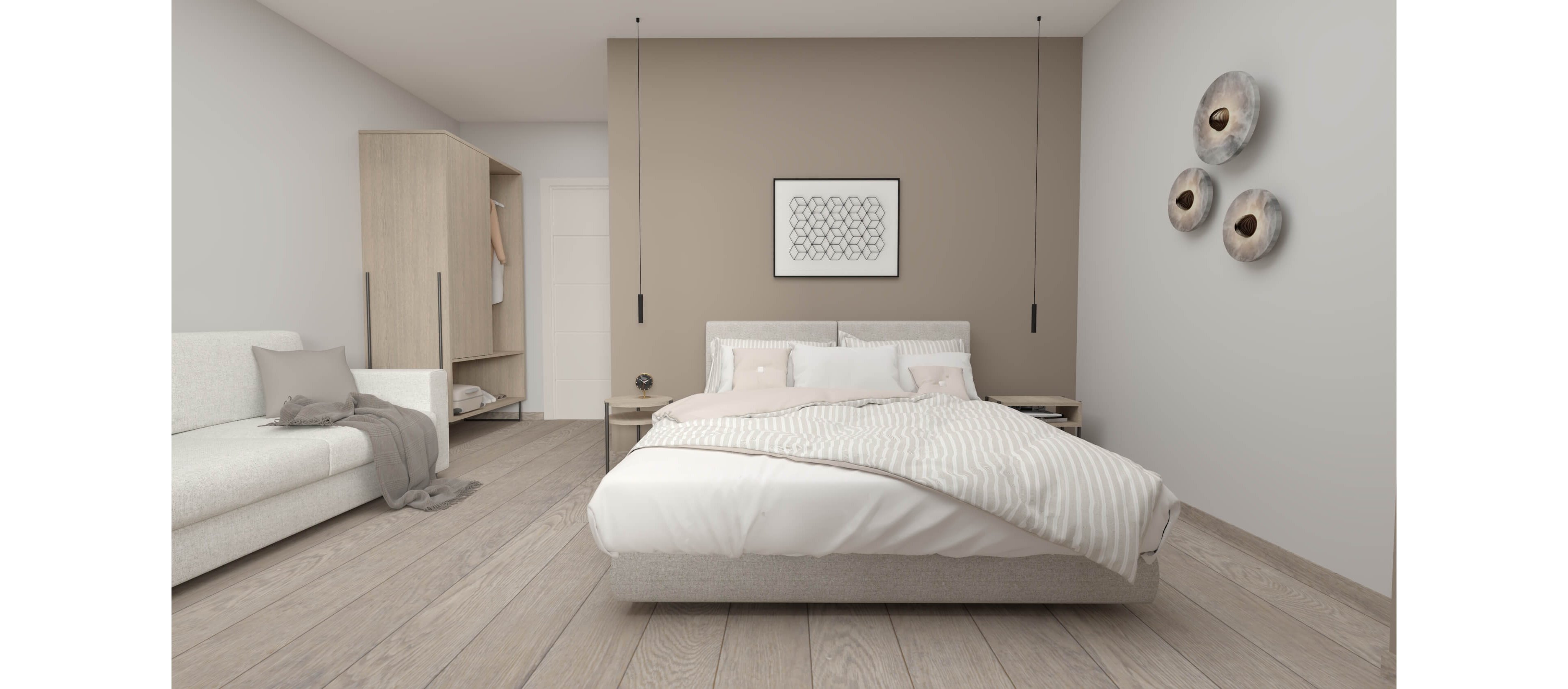 A contemporary bedroom features a low-profile bed with light bedding centered against a taupe accent wall. Pendant lights hang symmetrically on either side of the bed, and abstract wall art adds a subtle focal point. To the left, an open wardrobe and a light-colored sofa contribute to the clean, functional layout. The room is finished with wide plank wooden flooring and soft neutral tones for a calm, minimalist atmosphere.