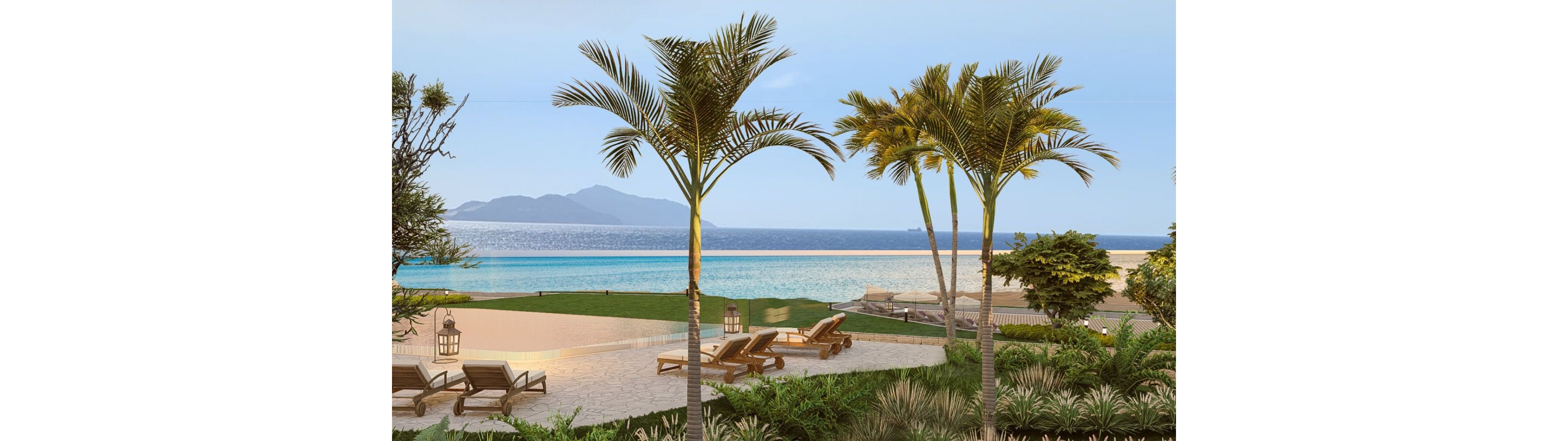 A serene beachfront resort terrace overlooks a calm blue ocean and distant mountains. Several lounge chairs are arranged on a paved patio beside manicured greenery and tall palm trees. Decorative lanterns and low walls frame the outdoor relaxation area, enhancing the upscale atmosphere. The clear sky and soft lighting suggest a peaceful, sunny vacation setting.