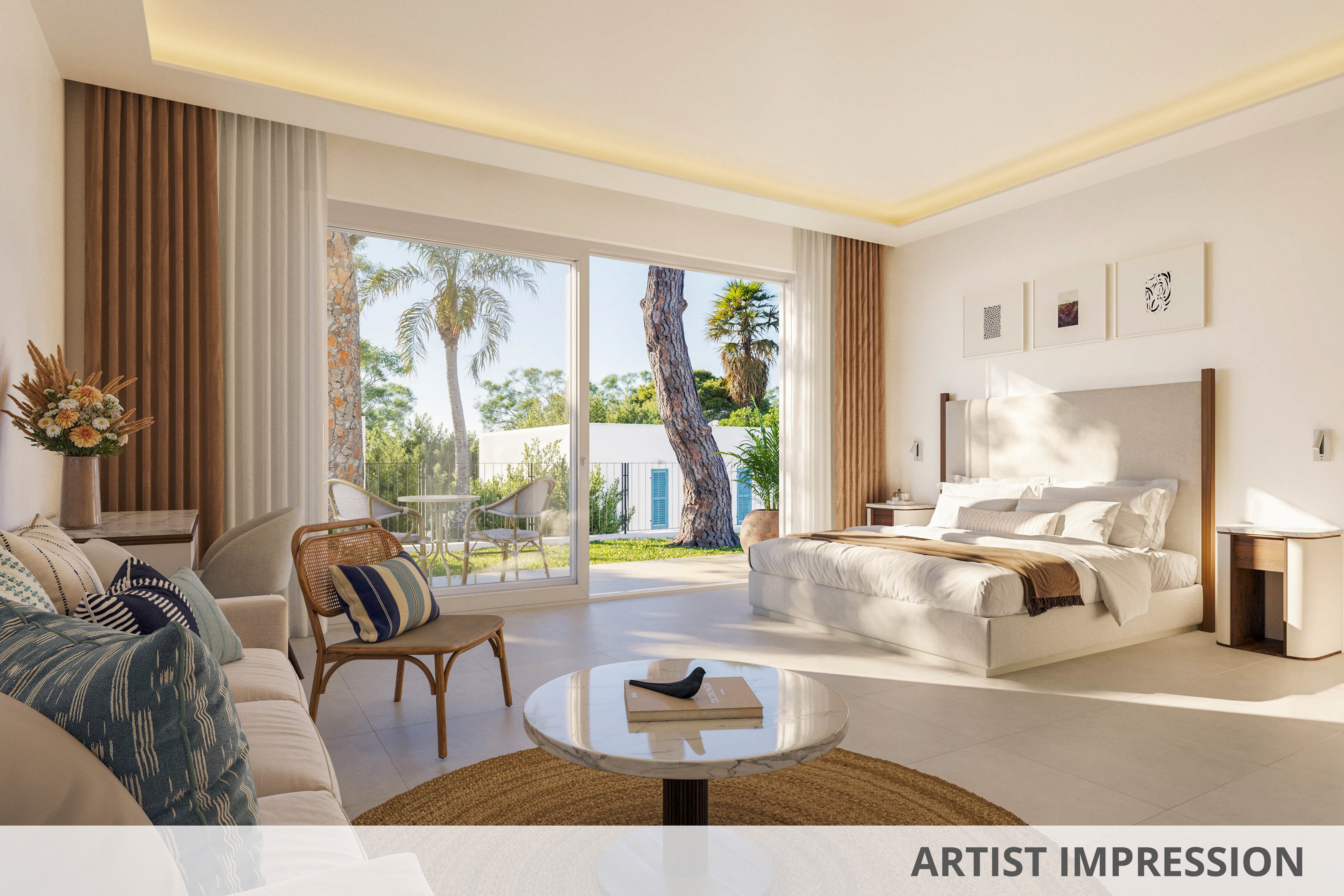 A spacious, sunlit hotel room features a large bed, cozy seating area, and a round coffee table. Floor-to-ceiling glass doors open to a terrace with views of palm trees and lush greenery. The interior is decorated in neutral tones with minimalist artwork, creating a calm and inviting atmosphere.