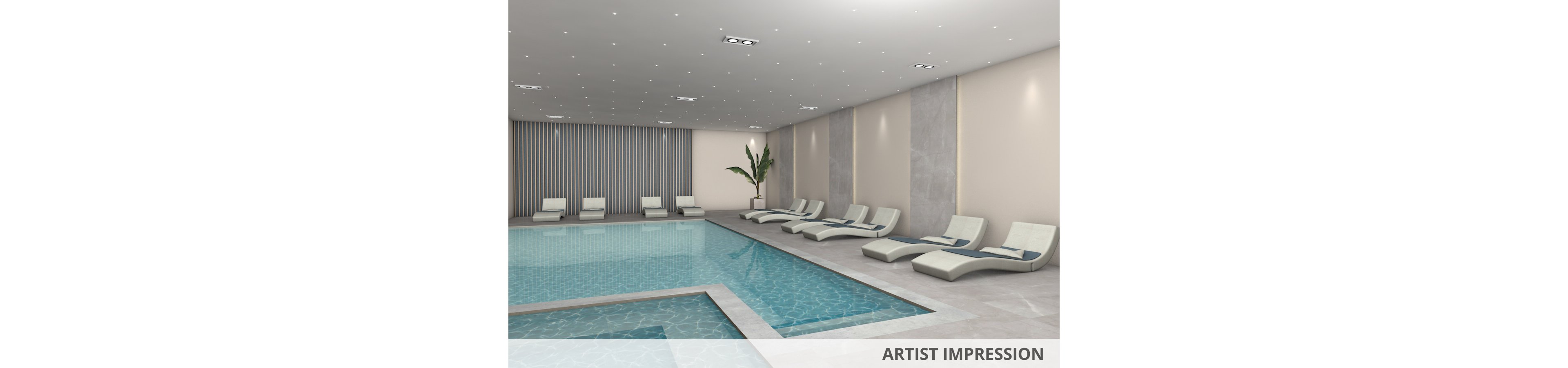 A contemporary indoor swimming pool is featured in this image, surrounded by sleek, white lounge chairs. The setting is minimalistic with neutral tones, soft lighting, and a single potted plant adding a touch of greenery. The water is clear and inviting, reflecting the ceiling lights and creating a tranquil atmosphere. No people are present, emphasizing a calm and serene mood.